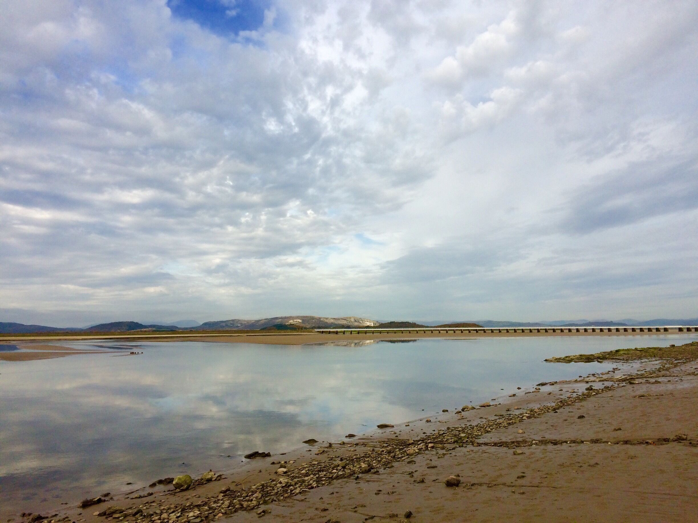 The Kent Estuary at Arnside. Watch out for quicksand and fast incoming tides here. Canoeists wait for the changing tide to surf the bore tide wave. 