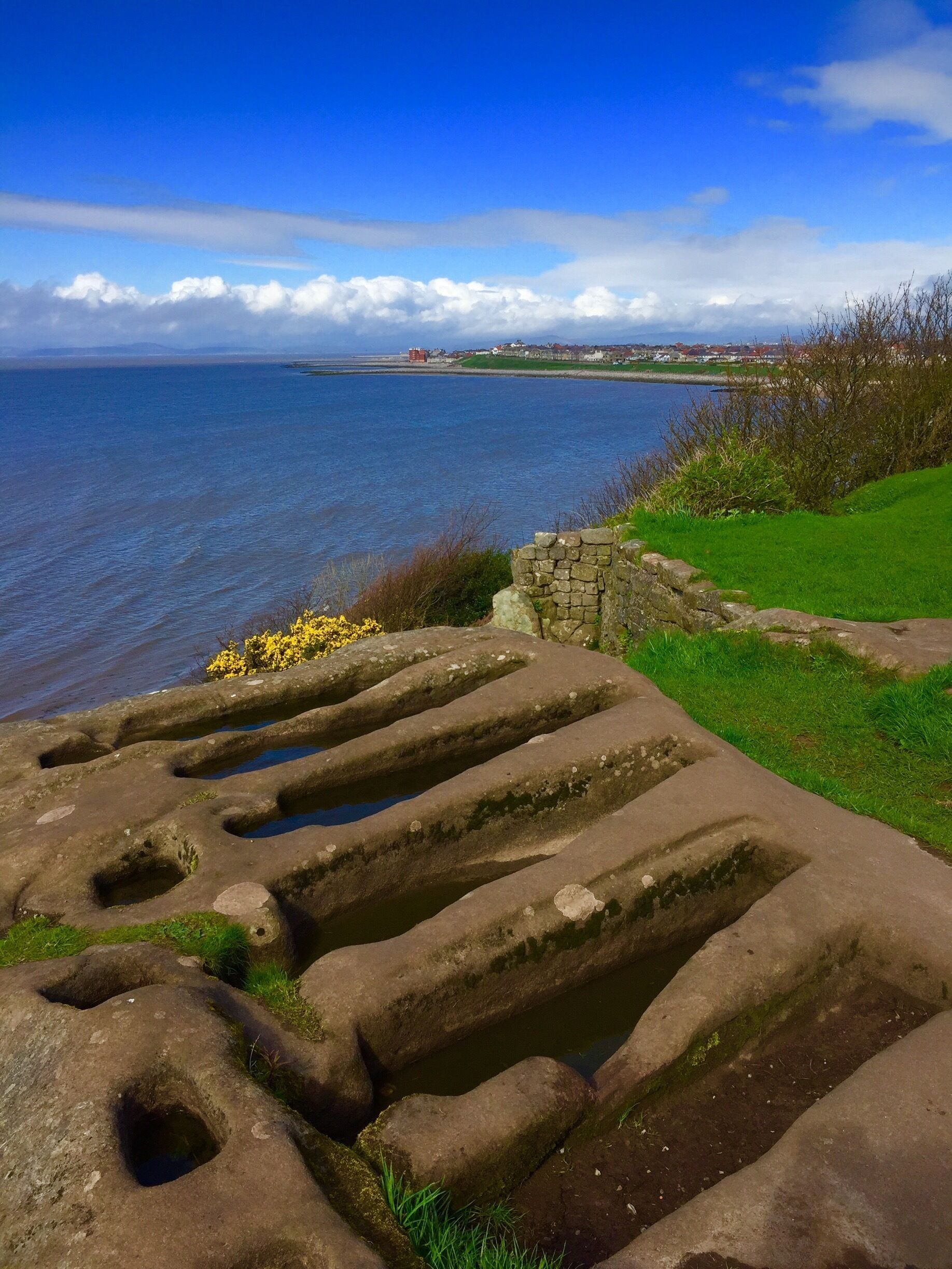 Rock cut tombs on cliff top at St. Patrick’s Chapel, Heysham. 
