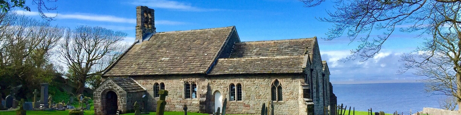 Quaint old church with Saxon, Norman and Gothic features overlooking Morecambe Bay.