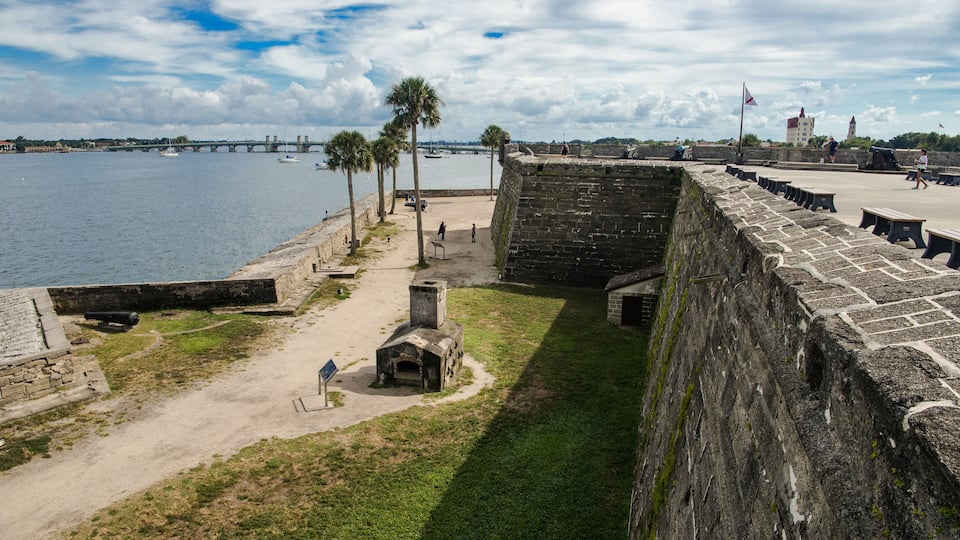 Waterfront stone walls of Castillo de San Marcos National Monument in St. Augustine, Florida.