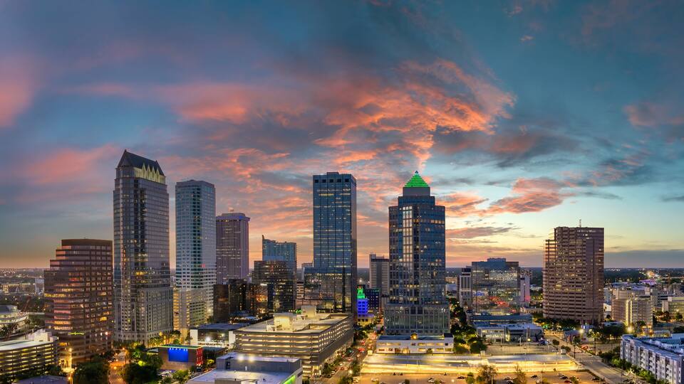 Tampa, Florida. High skyscraper buildings in downtown district. American city with business financial district at nightfall.