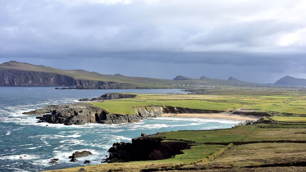 Clogher Head Car Park , Dingle Peninsula , Ireland
The view of Clogher Strand Beach and Three Sisters (group of three peaks) from Clogher Head Car Park.