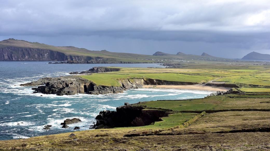 Clogher Head Car Park , Dingle Peninsula , Ireland
The view of Clogher Strand Beach and Three Sisters (group of three peaks) from Clogher Head Car Park.