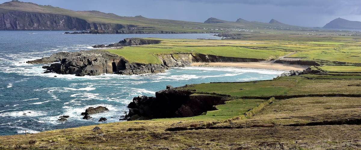 Clogher Head Car Park , Dingle Peninsula , Ireland
The view of Clogher Strand Beach and Three Sisters (group of three peaks) from Clogher Head Car Park.