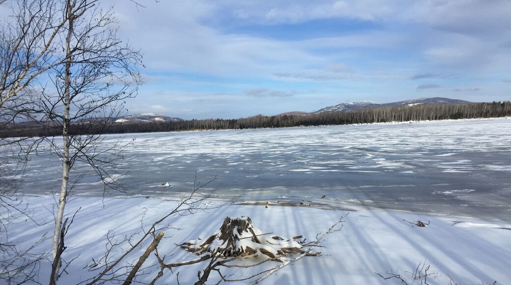 Flagstaff Lake has history there. A town was literally moved before it was flooded to become this lake. When you look at Google maps, you can see the old roads & building foundations. The Maine Huts & Trails is an awesome place to visit and stay.