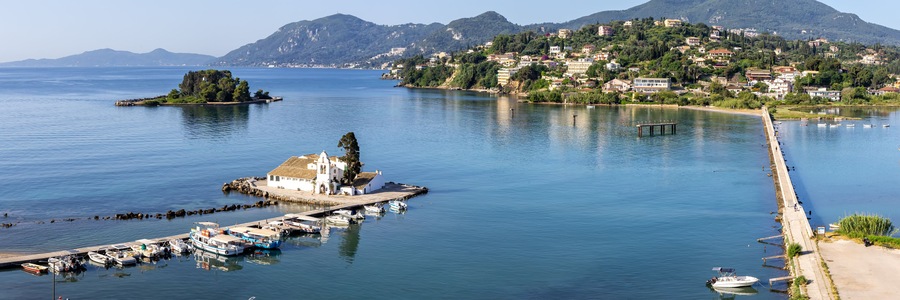 Vlacherna monastery and Mouse Island at Mediterranean sea panorama from above on Corfu island in Greece