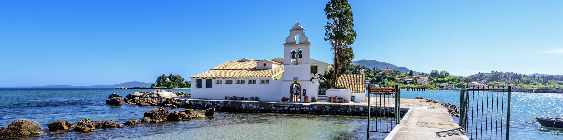 A view of Vlacherna monastery near Kanoni. Corfu, Greece.