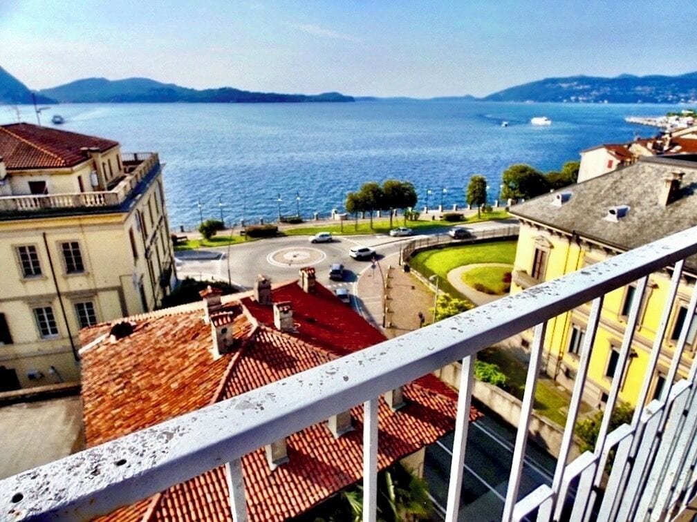 Attempting to capture the beauty of Intra on Lake Maggiore; with its beautiful lake and mountains; colorful, old villas; and promenade that winds its way through the city along the lake!