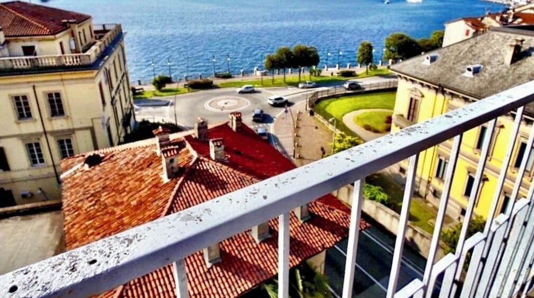 Attempting to capture the beauty of Intra on Lake Maggiore; with its beautiful lake and mountains; colorful, old villas; and promenade that winds its way through the city along the lake!