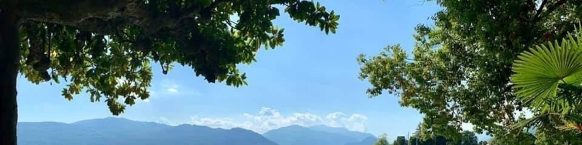 Park in Intra Verbania on Lake Maggiore! A panorama to capture the full breadth of the beauty. The area included beautiful hillside villas.
