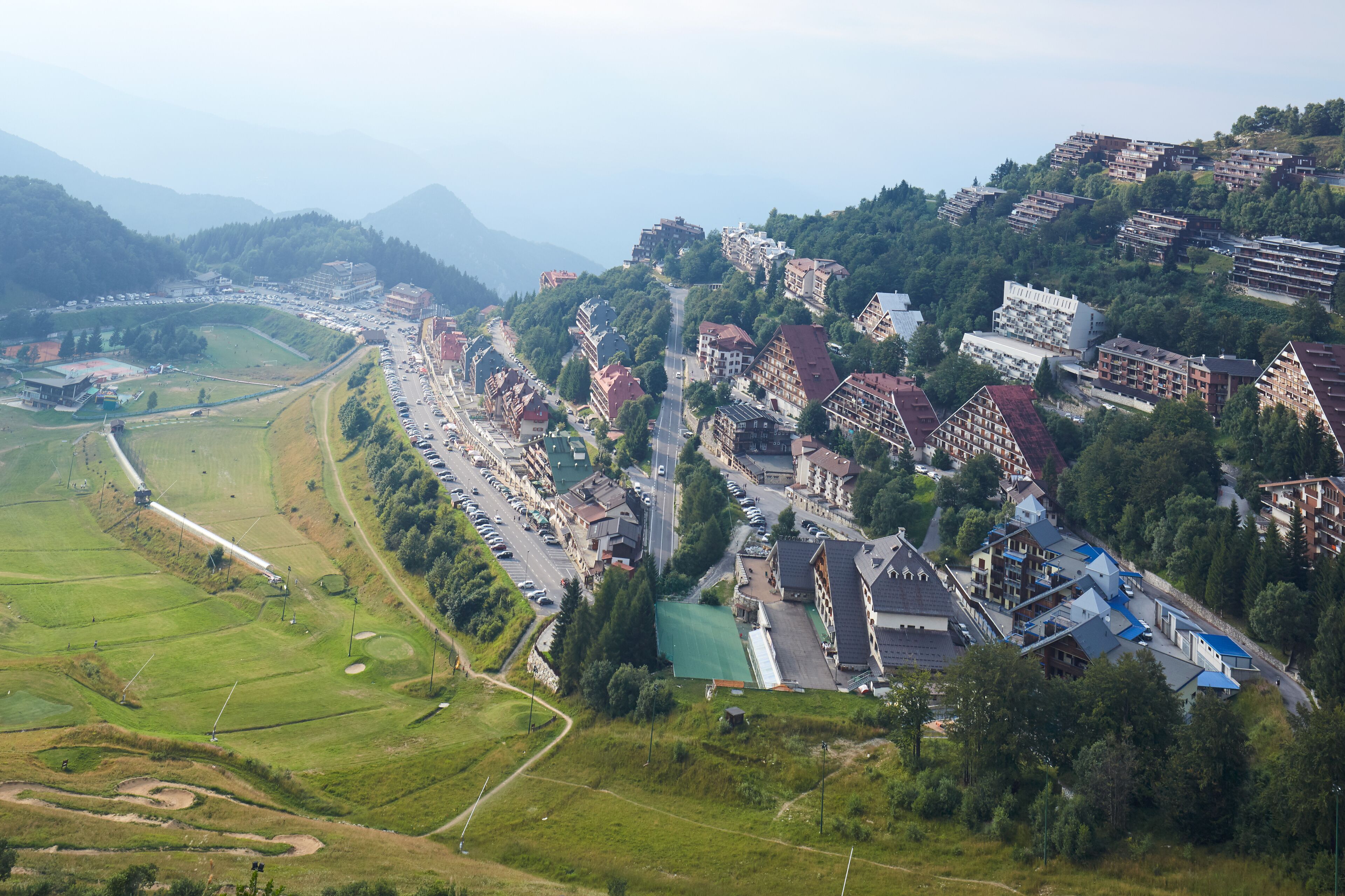 Prato Nevoso town high angle view with mist in a summer day in Prato Nevoso, Italy