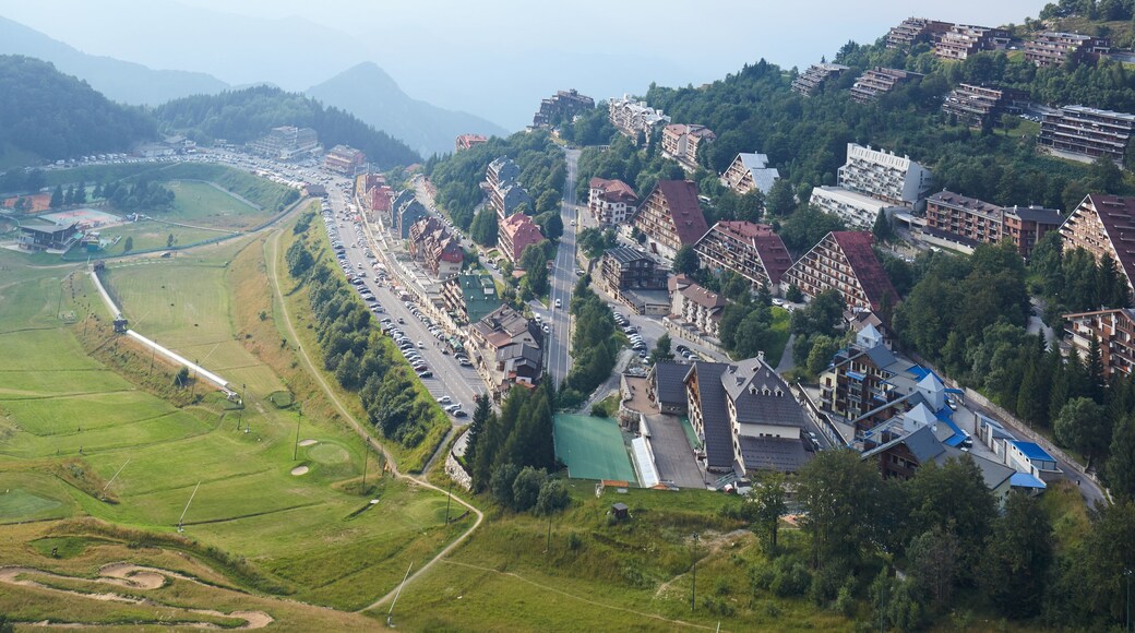 Prato Nevoso town high angle view with mist in a summer day in Prato Nevoso, Italy