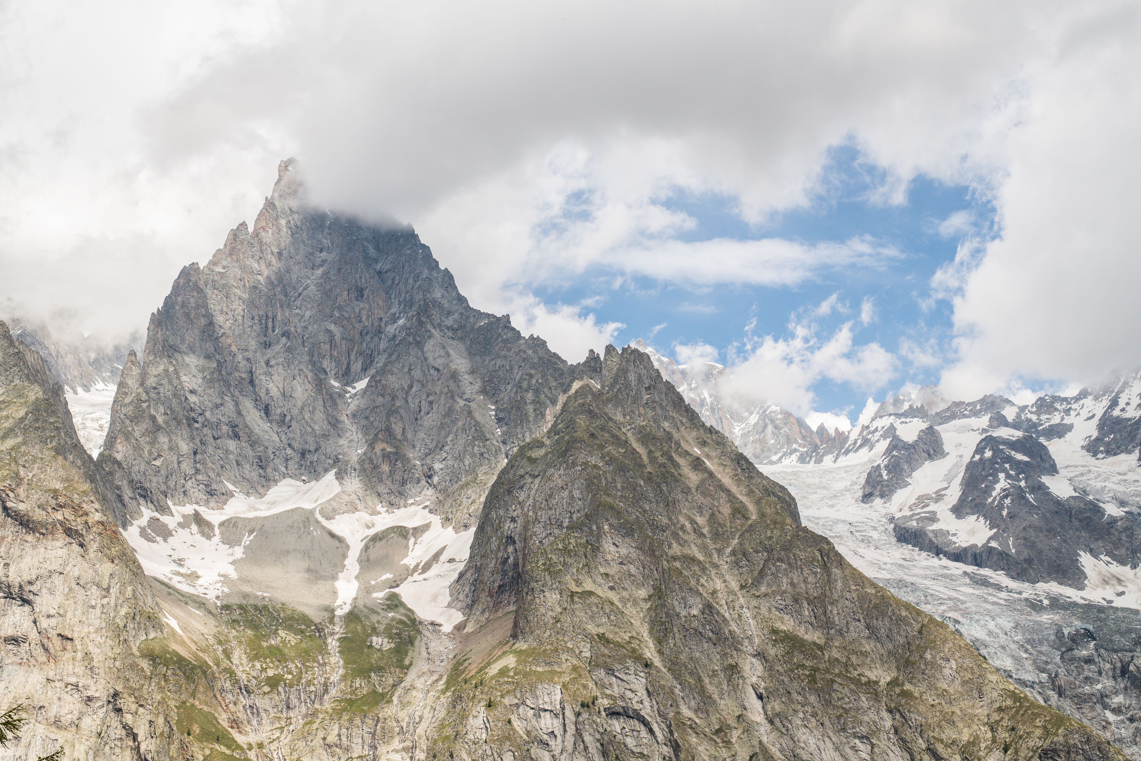 South side of the Mont Blanc massif in summertime seen from the Tour du Mont Blanc trail (TMB) at Col Checrouit