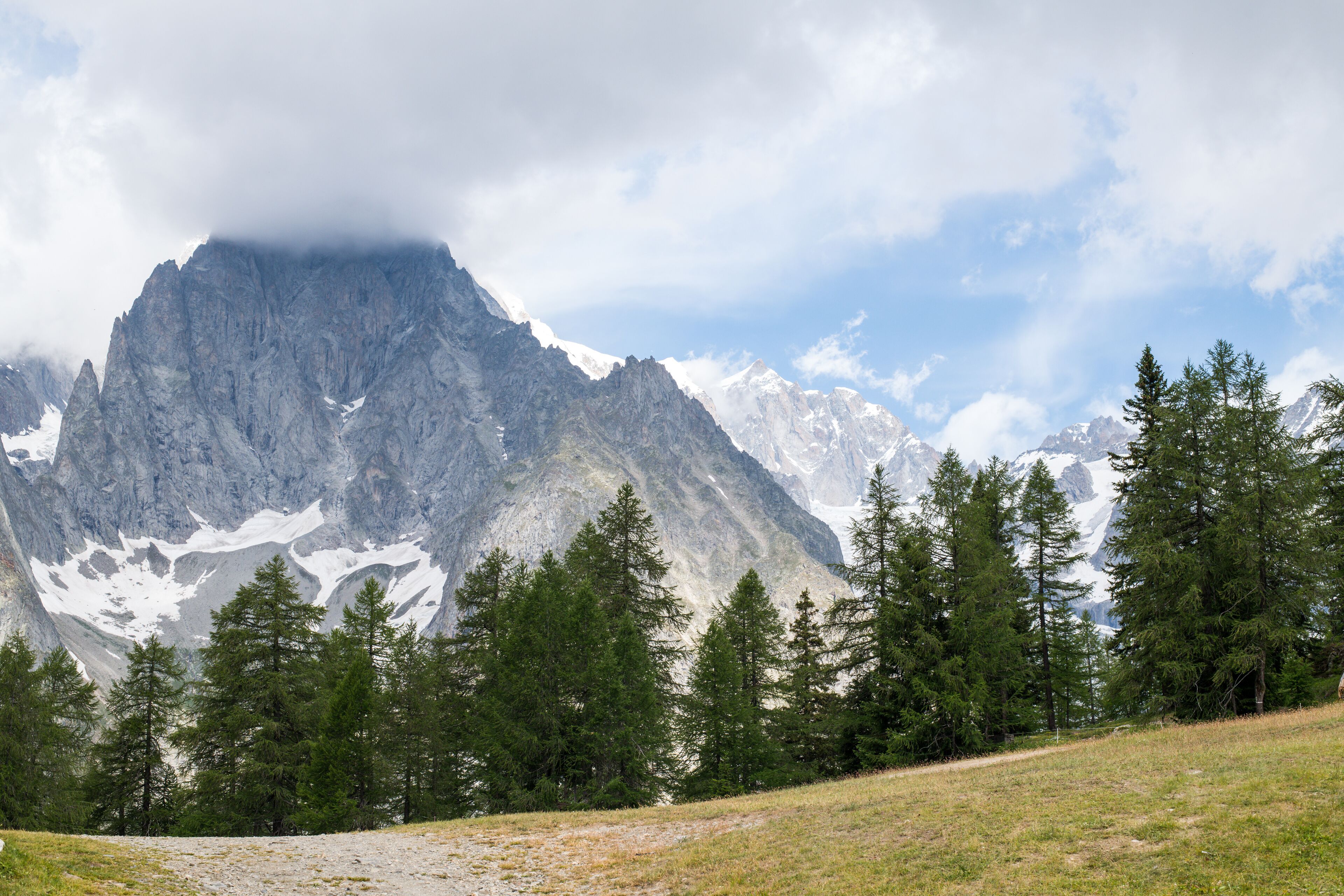 South side of the Mont Blanc massif in summertime seen from the Tour du Mont Blanc trail (TMB) at Col Checrouit