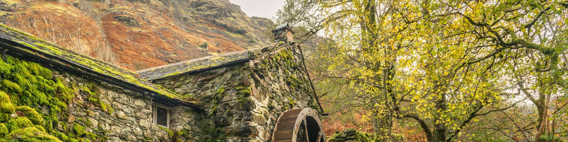 Old mill with a waterwheel built in the early 1800's in Borrowdale in the Lake District, Uk