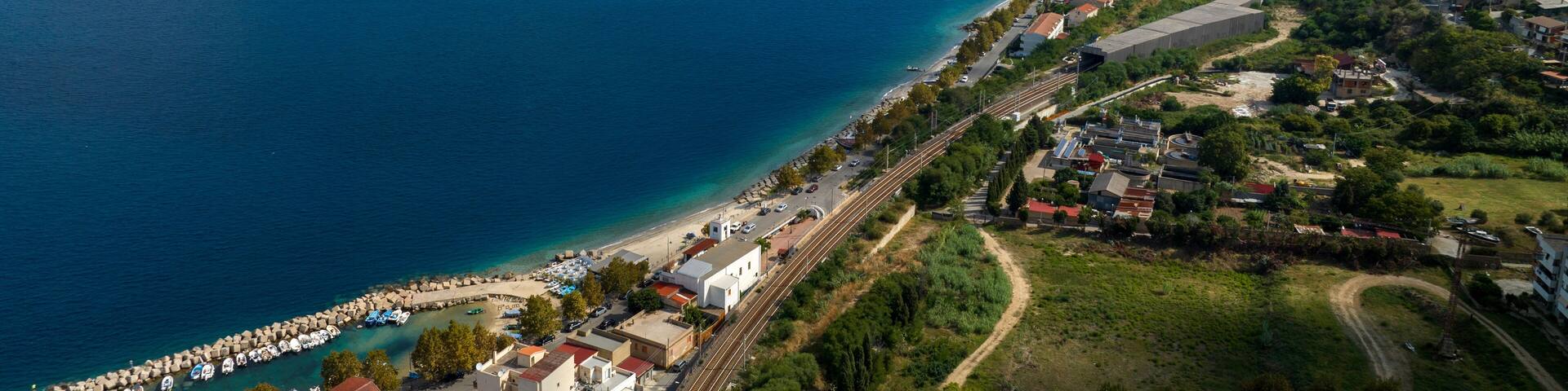 Aerial view of the narrowest point of the Strait of Messina, in southern Italy. This sea channel lies between Capo Peloro near Messina, Sicily, and Torre Cavallo, near Villa San Giovanni, Calabria.