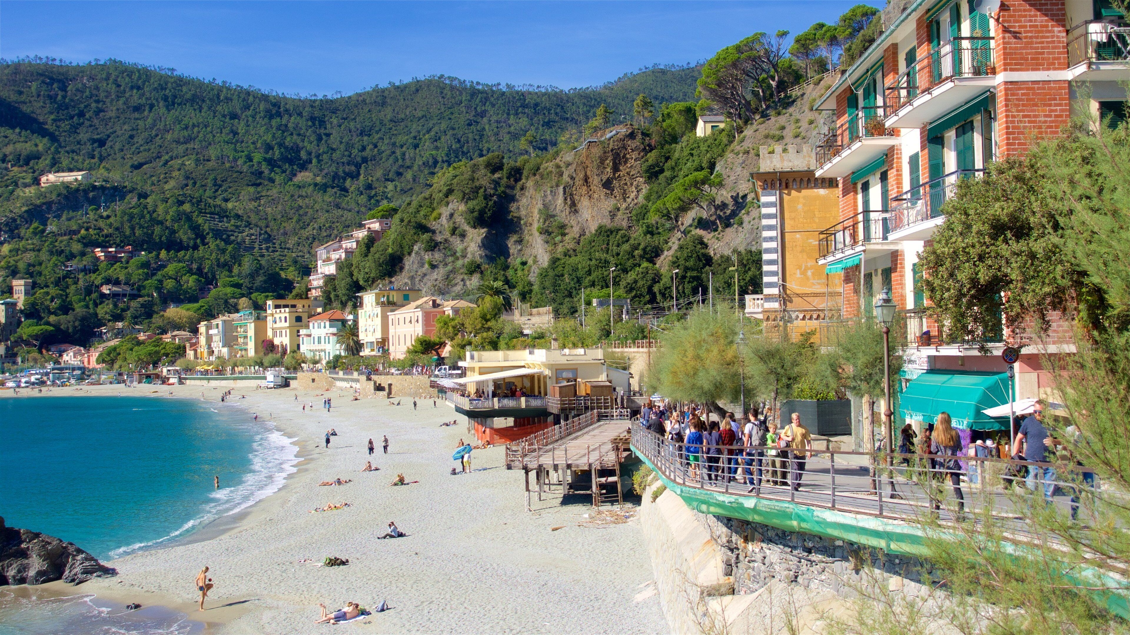 Italian Riviera featuring a coastal town and a sandy beach