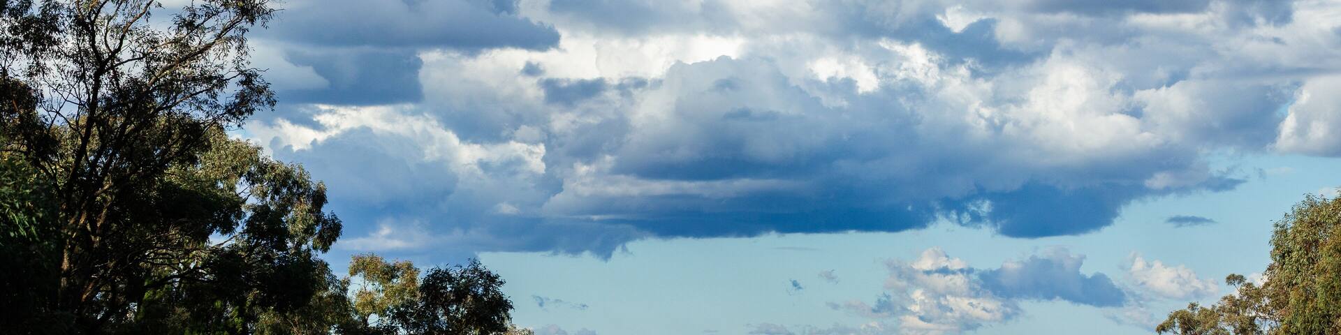 Green roadside sign with directions on B84 and Ulan Road on trip down Australian highway
