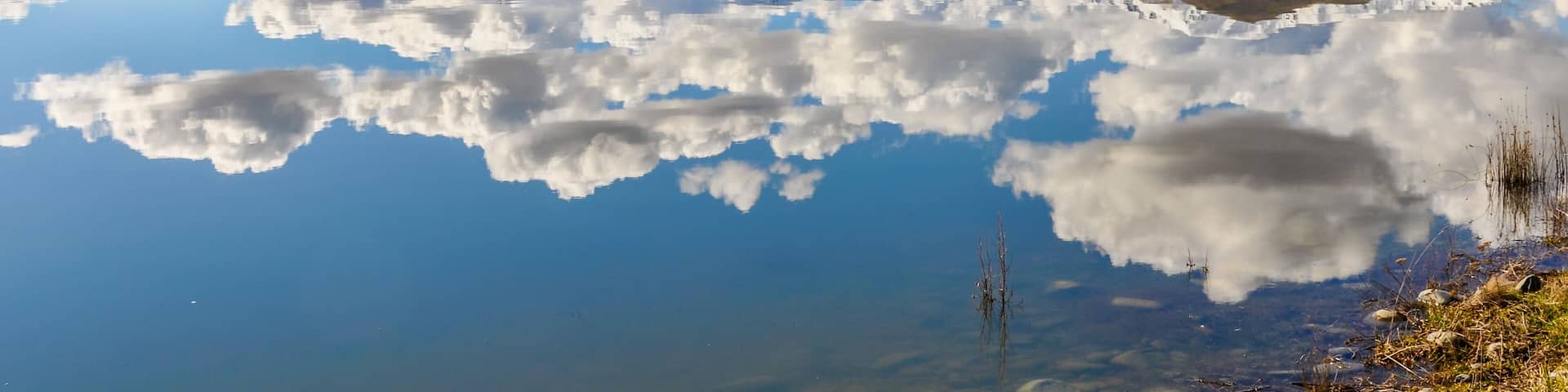Reflection of snowy mountains near Fairlie, New Zealand