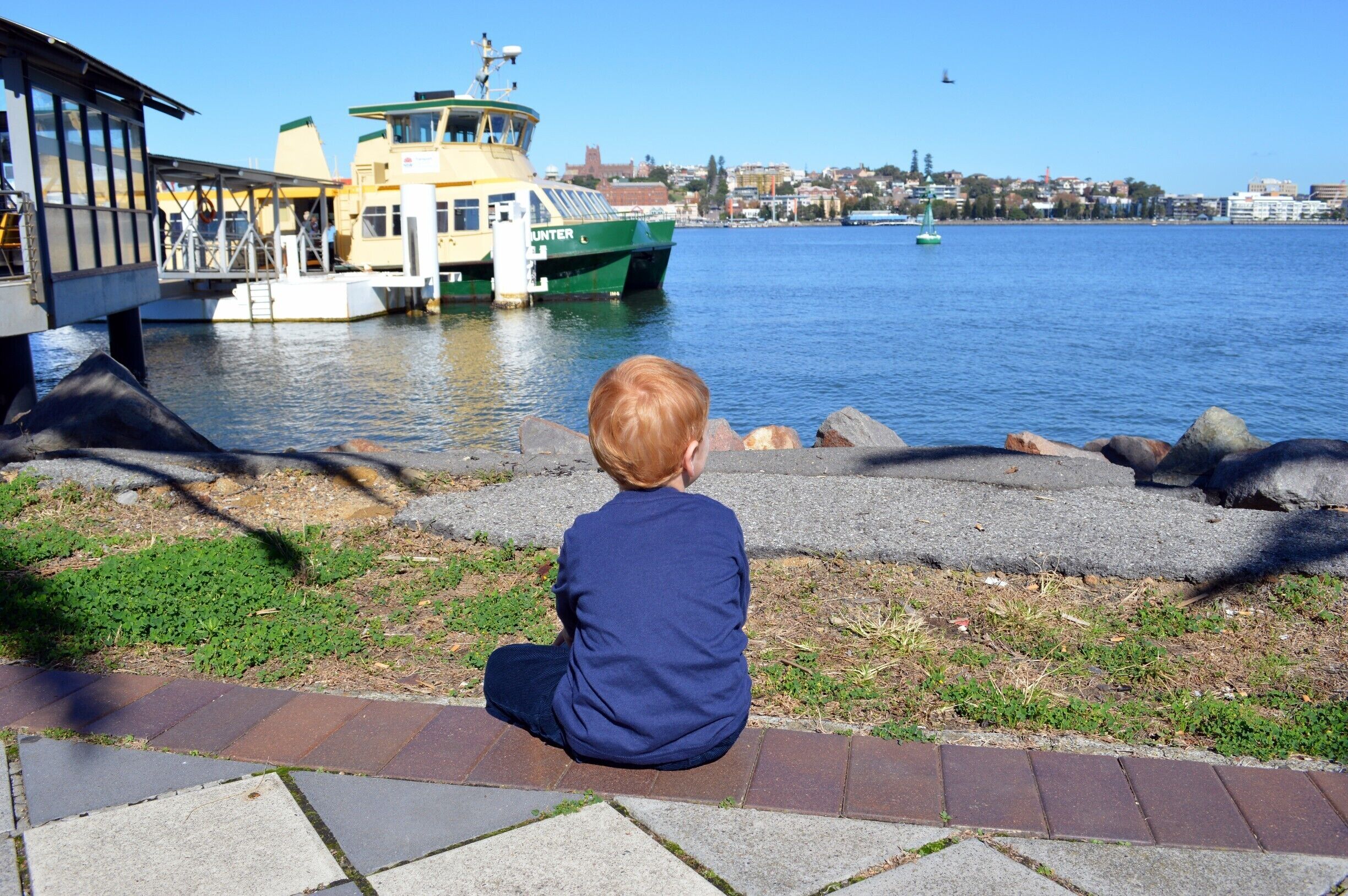 Watching the ferries coming and going at Stockton.  Newcastle City in NSW is in the distance.  
Please head over to my blog to read more about a day trip to Stockton.