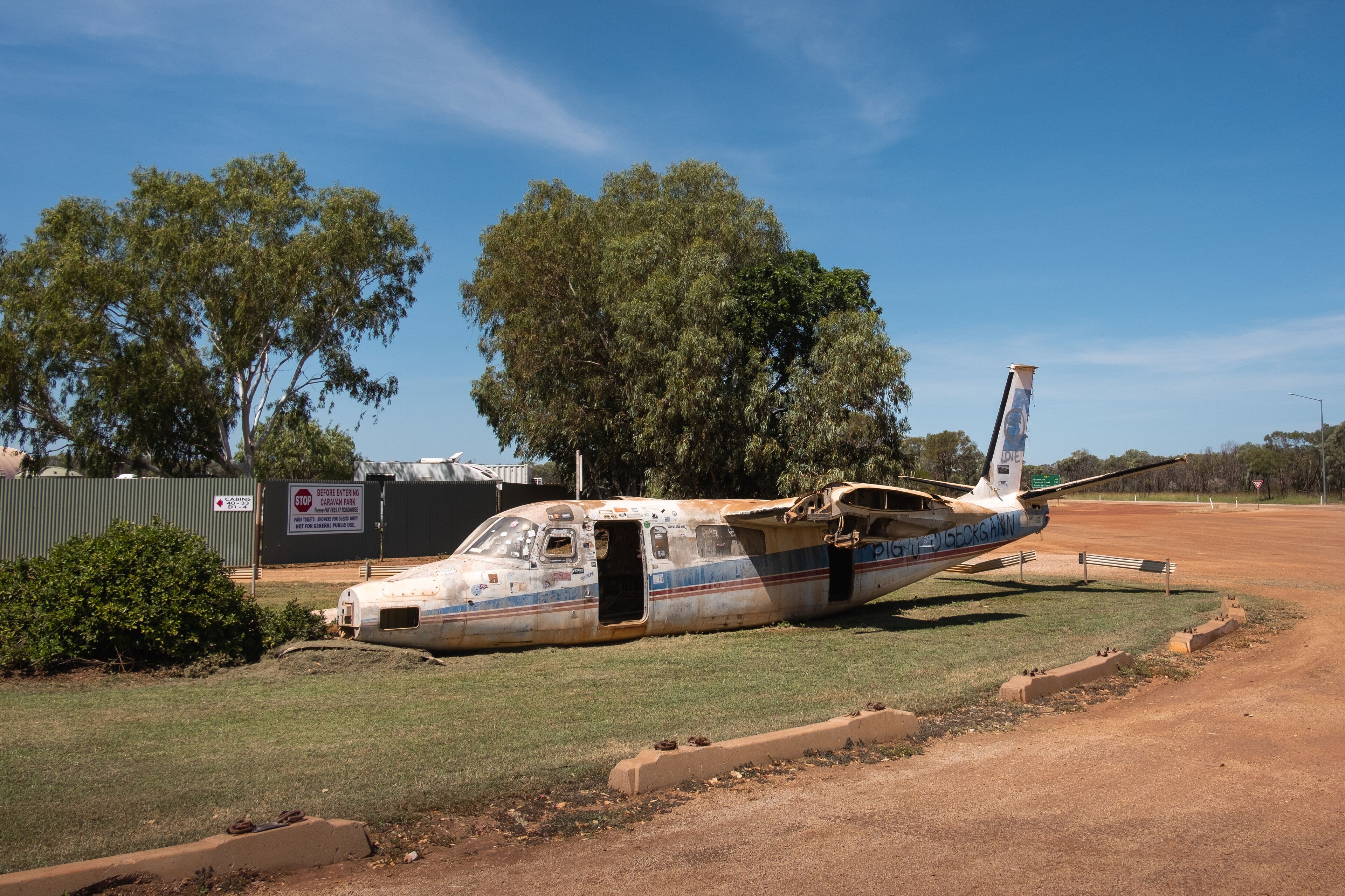 Old abandoned airplane exhibited outdoors. Small vintage plane. Daly Waters, Stuart Highway, Northern Territory NT, Australia