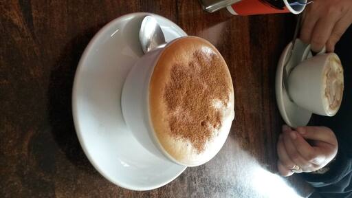 Having a cappuccino