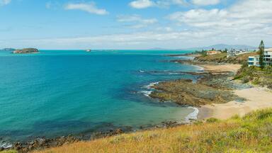 Emu Park which includes general coastal views and rocky coastline