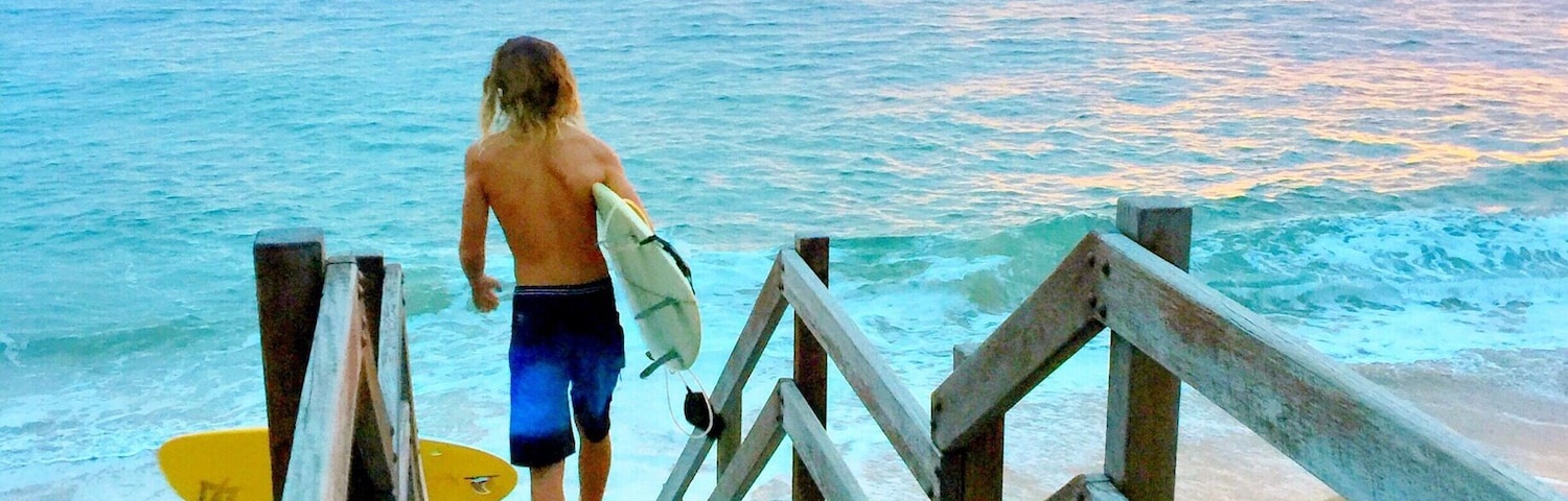 A surfer getting ready to ride some waves into the sunrise, Moffat Beach, QLD
#Blue #Queensland #Australia