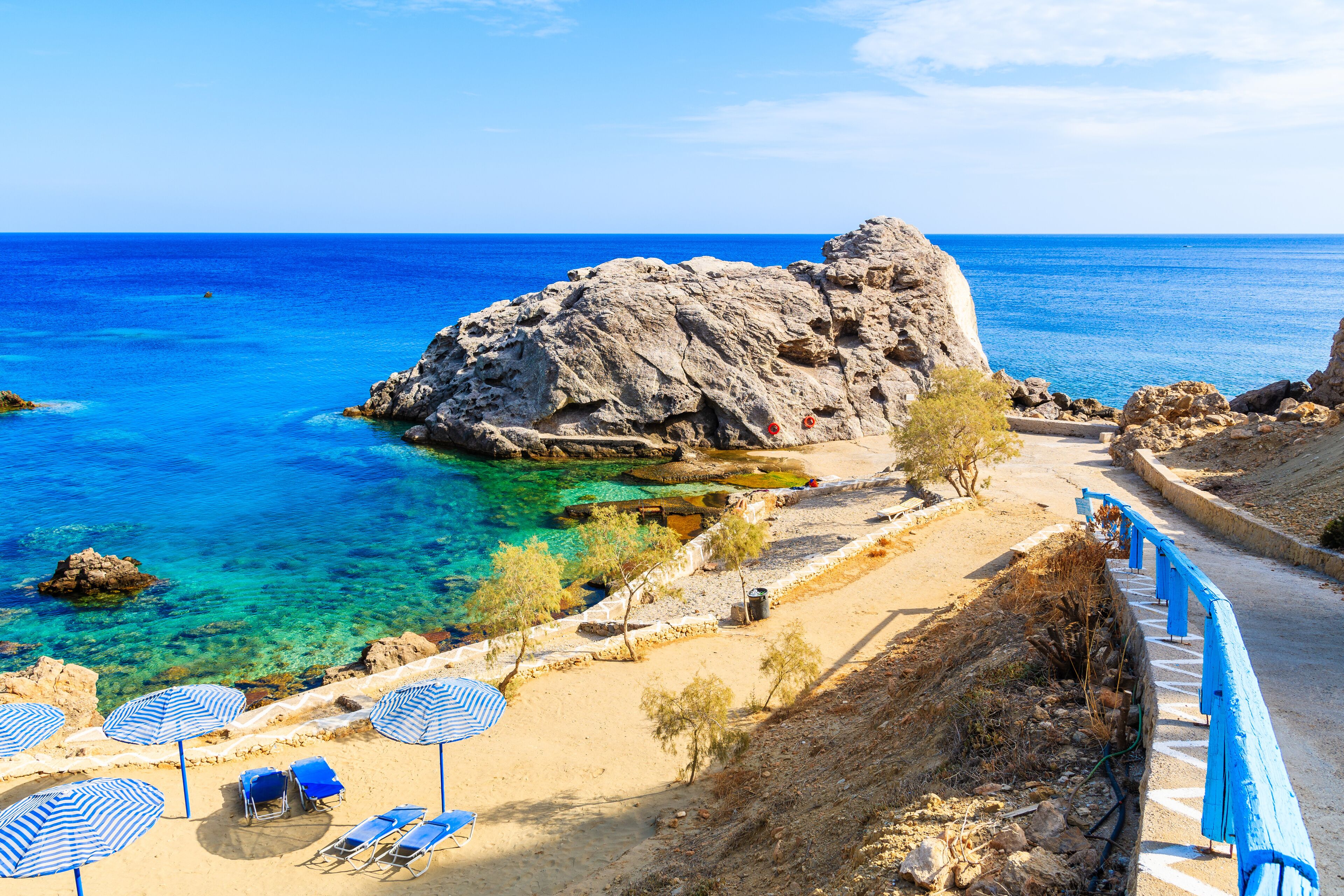 Beautiful bay with beach in Ammopi village on sea coast of Karpathos island, Greece