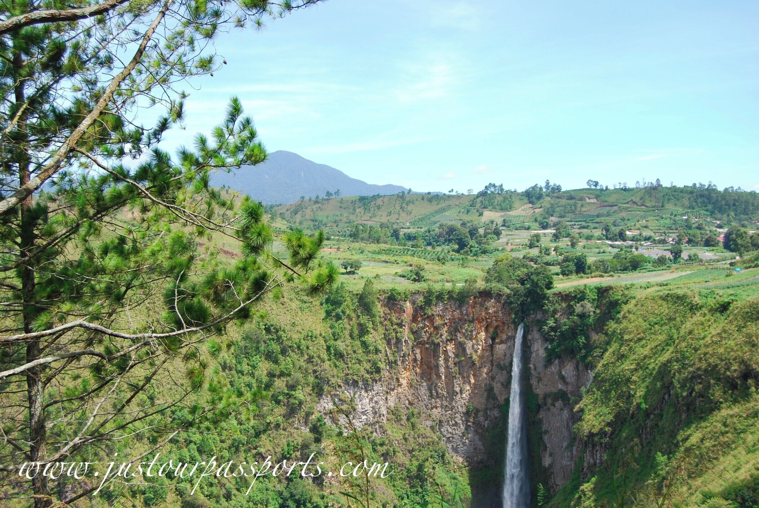 Sipiso Piso Waterfall sits just north of Lake Toba, Sumatra, Indonesia and is absolutely stunning. It is set in a one-of-a-kind landscape with gorgeous, lush green farmland surrounding the falls. The waterfall is 360 ft tall (120 m), plunging from an underground river to the level of Lake Toba. We went by private car on the way from Bergastagi to Parapat which was super convienent. 100% worth taking the time to travel out of your way to see this! You can walk down to the bottom and play in the pools at the base of the falls. There are paved stairs but it's a work out for sure on the way back up! 