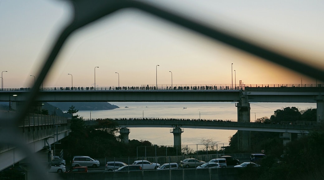 Hatsu-hinode, the tradition of waking up early on New Years Day to watch the first sunrise of the year, is still popular in Japan. Some climb mountains, others go to the shore, or people in the city watch from their balconies or from towers.
If you are in the Imabari area, Kurushima Kaikyo Bridge is the perfect spot to watch the sunrise above the Seto Inland Sea.