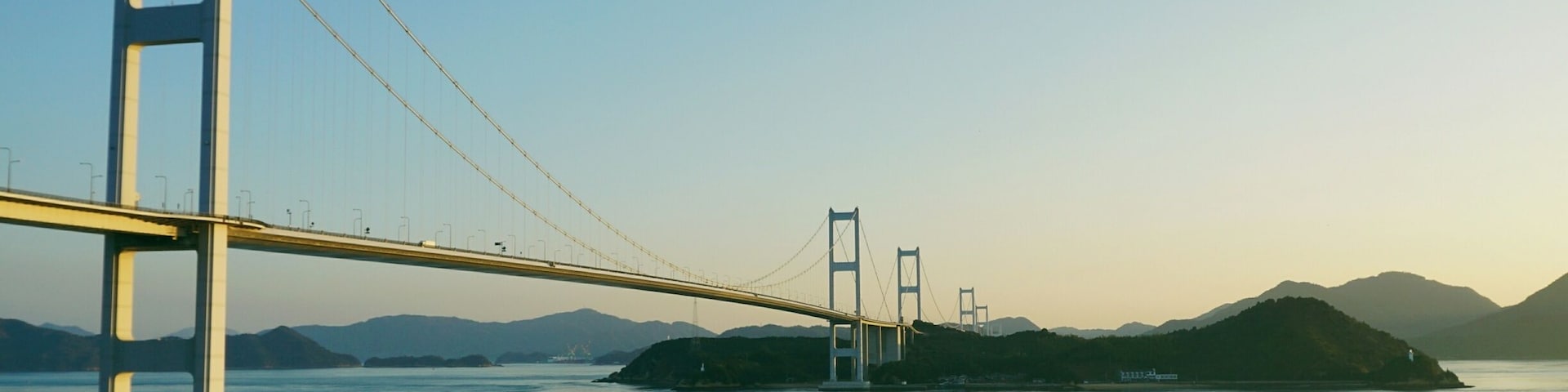 This is the view from Sunrise Itoyama, a cycling facility equipped with retal bikes, hostel, public bath and even a cafe. 
Many people who cycle across the Shimanami Kaido use this spot to rest and refuel. Isn't the view fantastic?