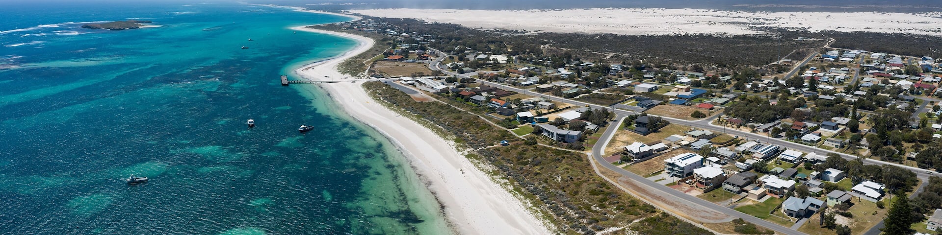 Aerial view of the small town of Lancelin in Western Australia, famous for the turquoise clear waters and sand dunes behind the town which can be surfed