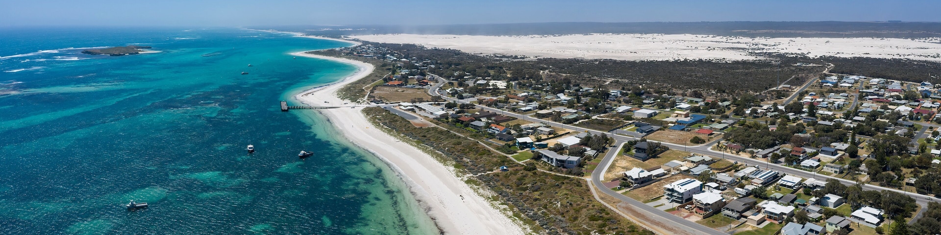 Aerial view of the small town of Lancelin in Western Australia, famous for the turquoise clear waters and sand dunes behind the town which can be surfed