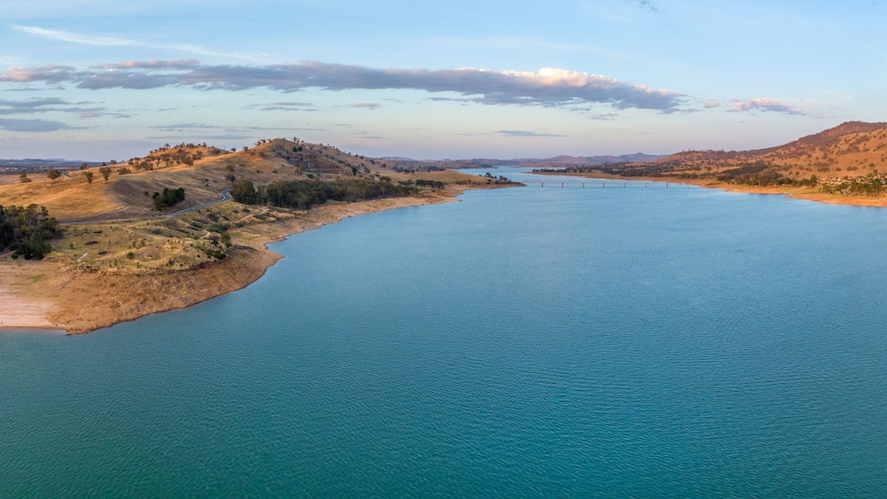 Aerial panorama of Murray River and Lake Hume at sunset with copy space