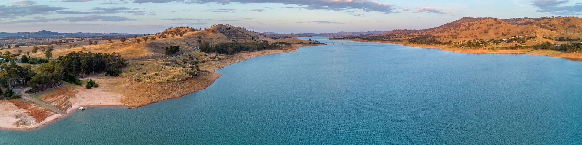 Aerial panorama of Murray River and Lake Hume at sunset with copy space