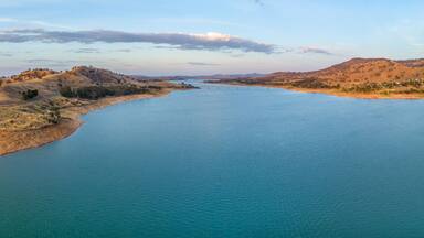 Aerial panorama of Murray River and Lake Hume at sunset with copy space