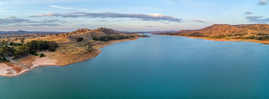 Aerial panorama of Murray River and Lake Hume at sunset with copy space