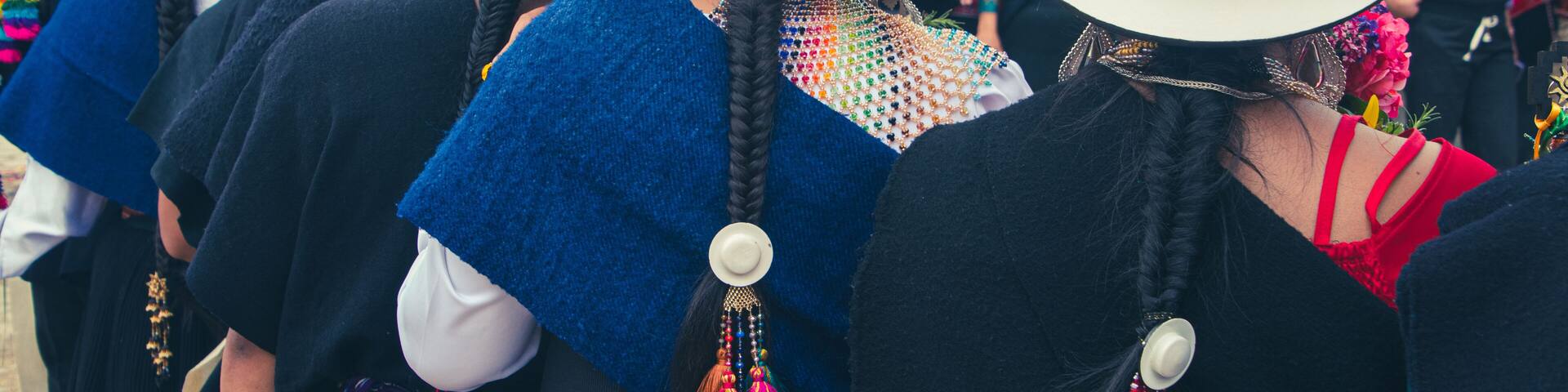Indigenous women of the Saraguro people dressed in their traditional costumes at the Inti Raymi festival