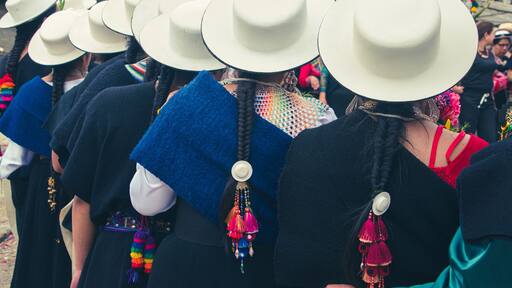 Indigenous women of the Saraguro people dressed in their traditional costumes at the Inti Raymi festival