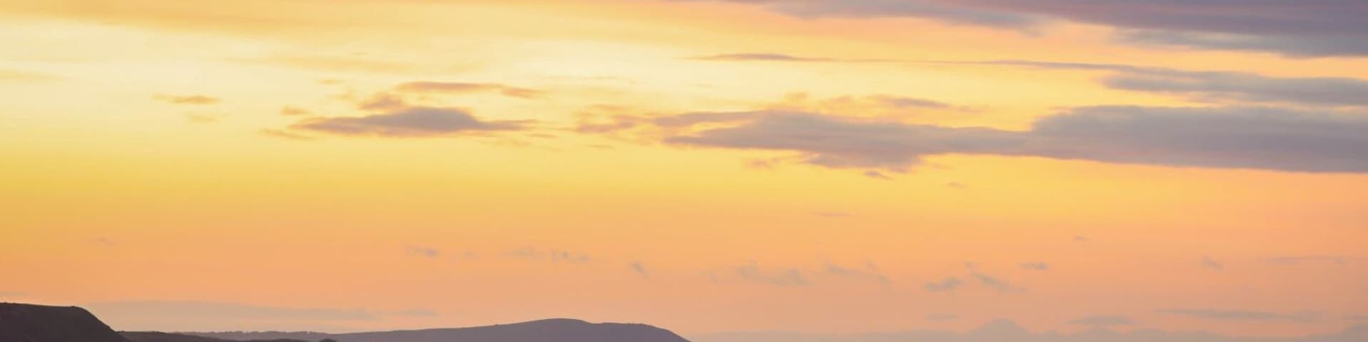 Sunrise at Sunderland Bay where the little penguins live. Looking towards Woolamai with Pyramid Rock in the mid ground.