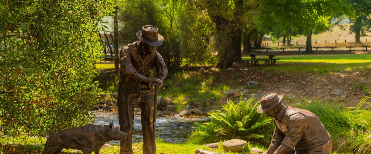 Harrietville featuring a statue or sculpture and a river or creek