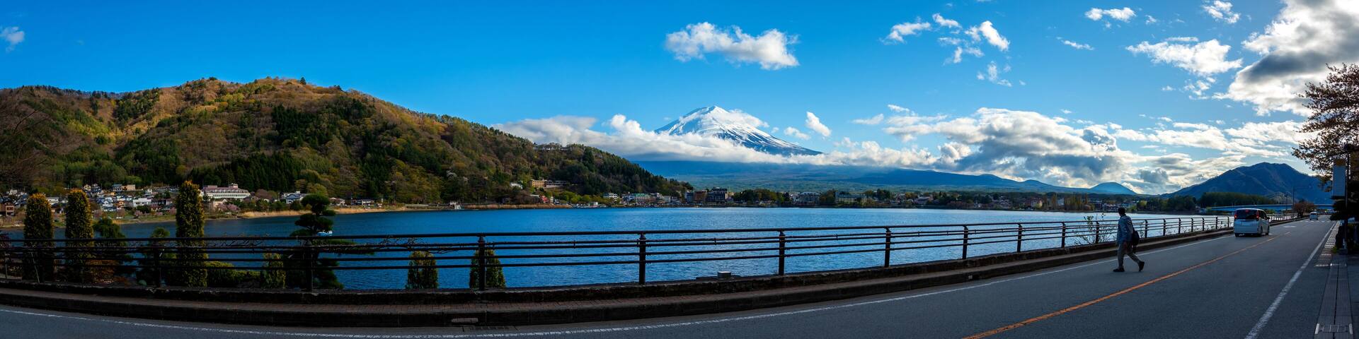 Panorama image of mountain Fuji and Lake Kawaguchi(Fujikawaguchiko-machi)with blue sky on evening time.