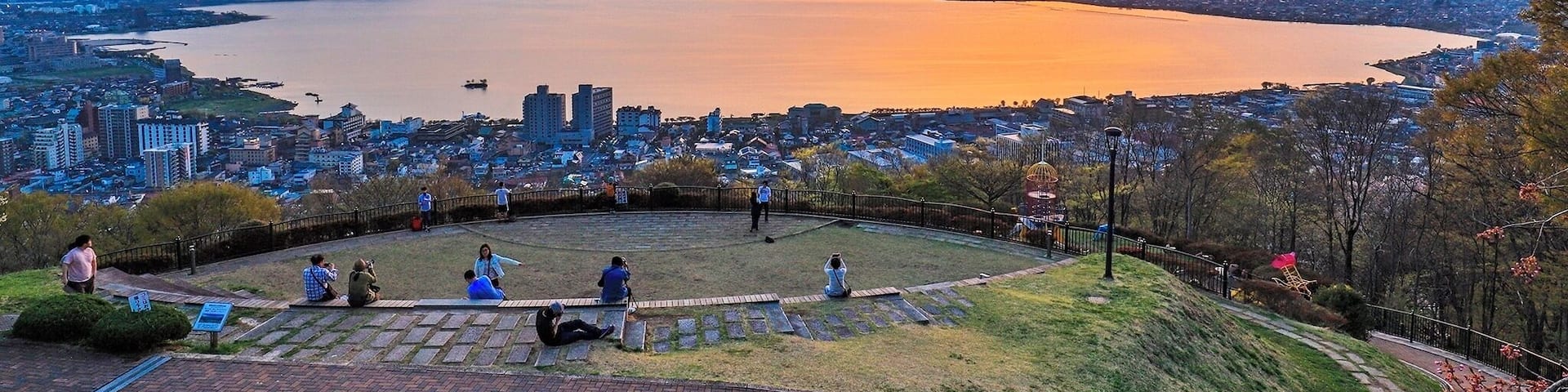 Tateishi Park is a good place to see the sunset over the Lake Suwa in Nagano of Japan.