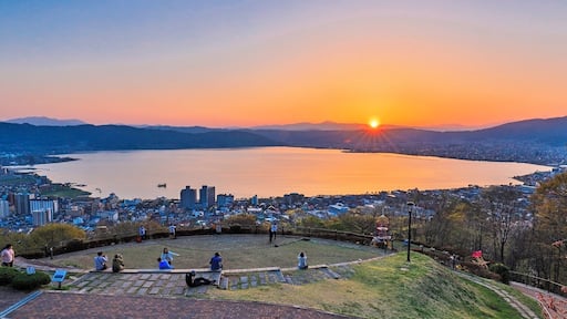 Tateishi Park is a good place to see the sunset over the Lake Suwa in Nagano of Japan.