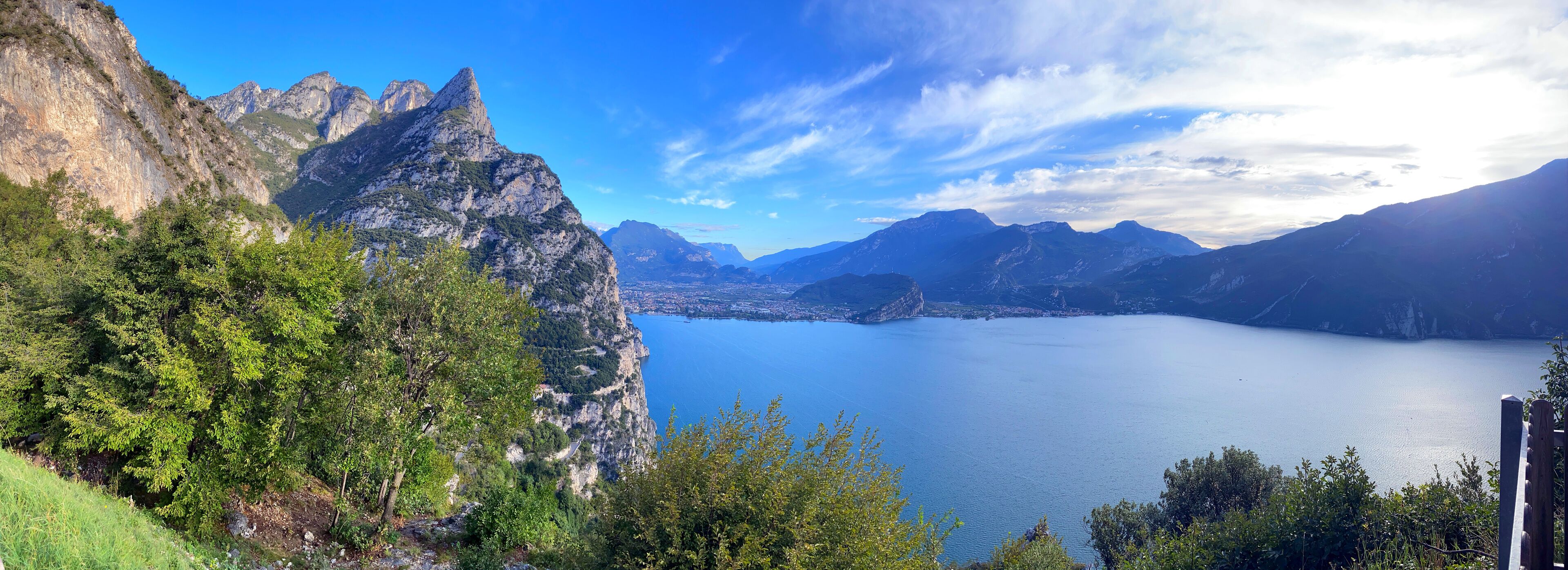 A mountainous landscape with a lake and a clear sky.