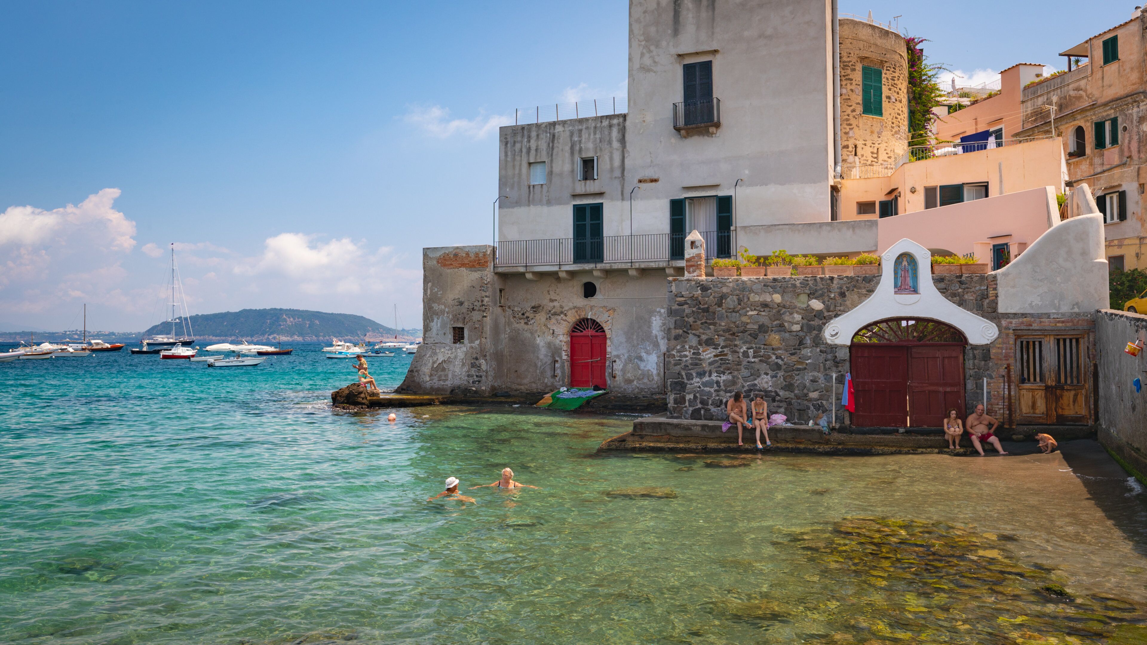 Ischia showing swimming, a coastal town and general coastal views