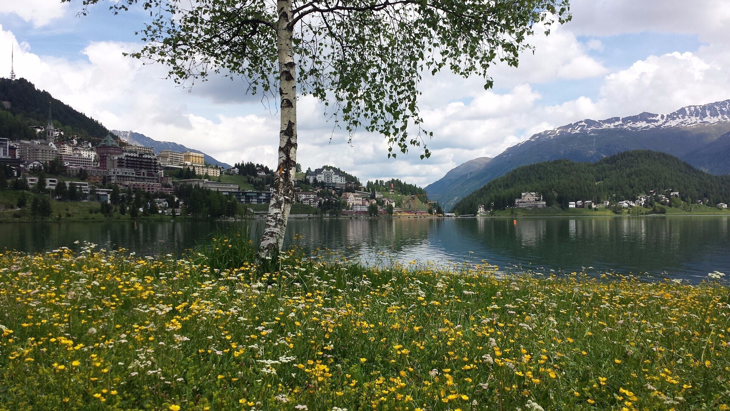 Looking across the lake in St. Moritz, Switzerland in the summer.