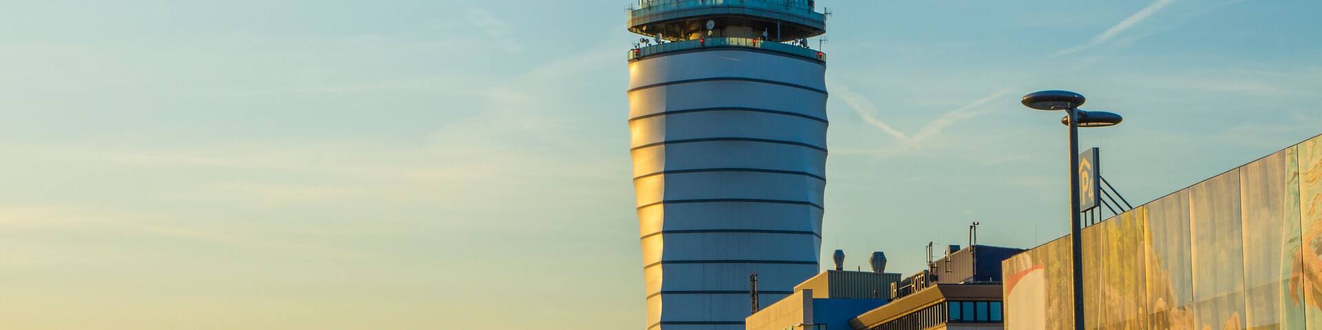 Airport traffic control tower at vienna International Airport on a clear sunny day. Austria.
