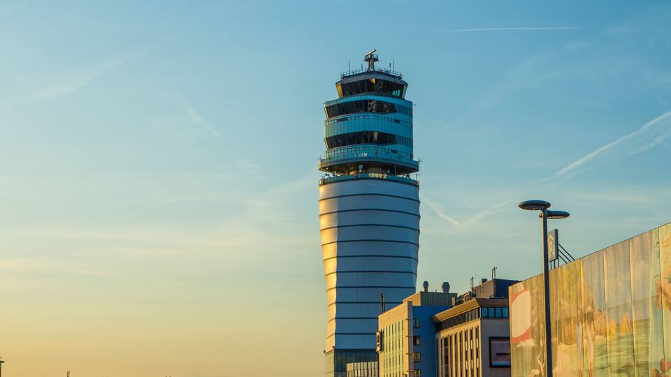 Airport traffic control tower at vienna International Airport on a clear sunny day. Austria.